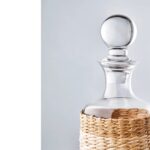 3-piece glass and decanter set with rattan wrap – stylish drinkware for bar or home use.