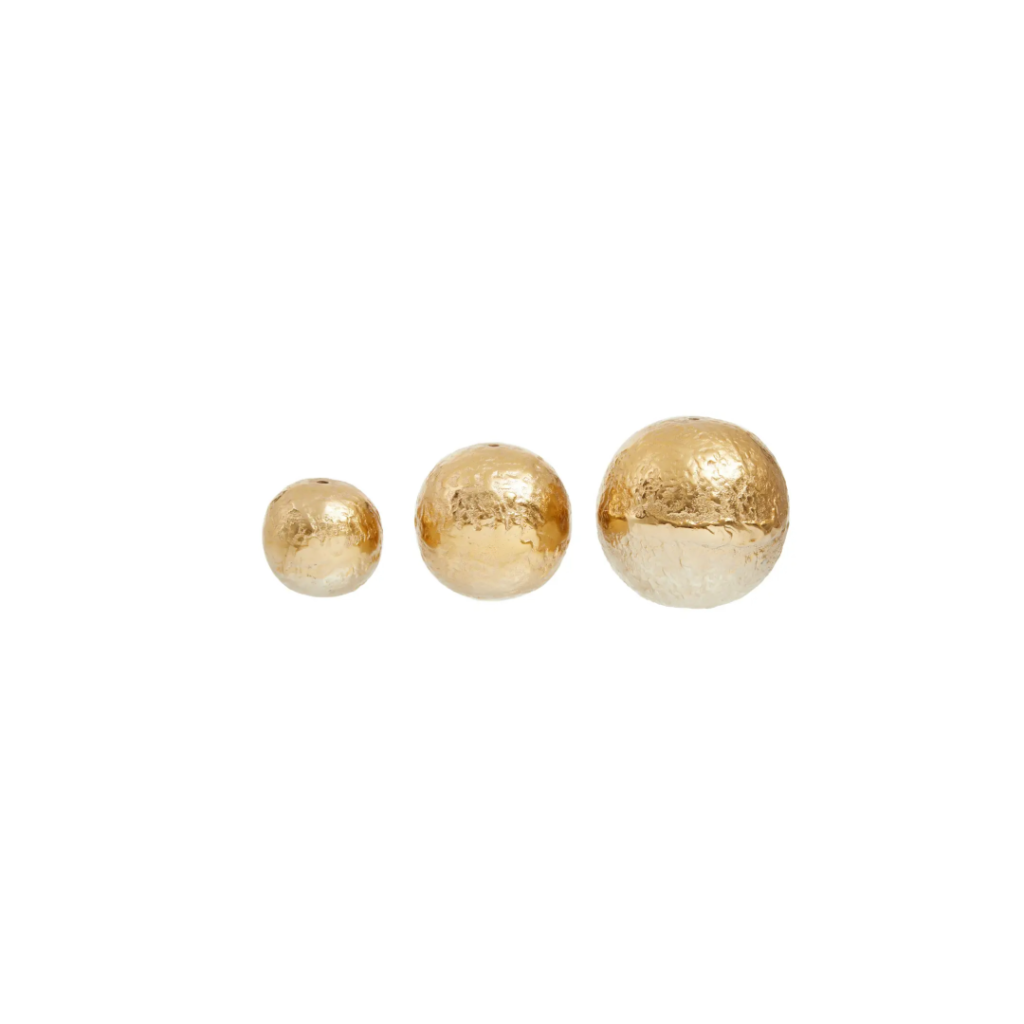 Set of three metallic gold and silver gradient decorative aluminium spheres.