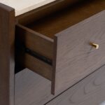 Dark brown oak chest of drawers with six drawers, white stone top, and elegant side profiles—designed for luxury interiors and refined storage.