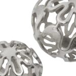 Pair of silver aluminium decorative spheres with cut-out pattern and polished finish.