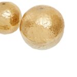 Set of three metallic gold and silver gradient decorative aluminium spheres.