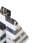 Set of two striped black and white marble bookends with a geometric triangular design.
