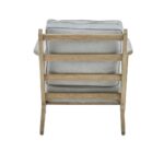 Oak armchair with grey linen cushions, slatted back, and mid-century modern design featuring pointed legs and straight arms.