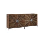 Elmwood sideboard with silver sunburst door design and silver iron handles.