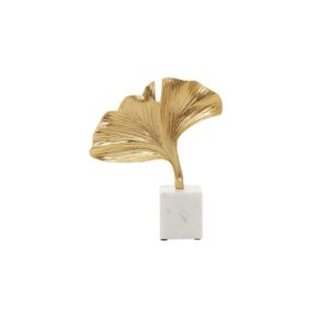 Gold ginkgo leaf sculpture on white marble base – botanical-inspired décor accent.