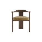 Contemporary armchair with a walnut-finished wood frame and Havana-coloured cushion in VEROTEX fabric, designed for modern, eco-conscious interiors.