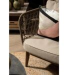 Square cushion with embroidered abstract motifs in pink tones, crafted from cotton, acrylic, and polyester blend.