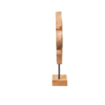 Mango wood ring sculpture with natural grain patterns, mounted on black iron rods and a matching wood base for a rustic-modern statement.