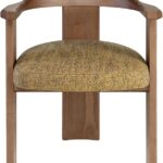 Contemporary armchair with a walnut-finished wood frame and Havana-coloured cushion in VEROTEX fabric, designed for modern, eco-conscious interiors.