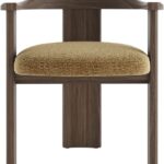 Contemporary armchair with a walnut-finished wood frame and Havana-coloured cushion in VEROTEX fabric, designed for modern, eco-conscious interiors.