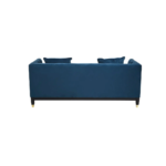 Two-seat navy fabric Chesterfield-style sofa with button tufting and gold-accented wooden legs.