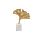 Gold ginkgo leaf sculpture on white marble base – botanical-inspired décor accent.