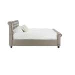 Romir king-size bed with grey velvet upholstery, rolled headboard and footboard, button tufting, and lift-up ottoman storage.