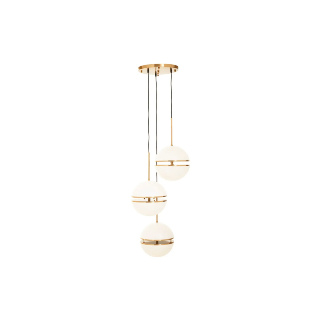 Three-globe pendant light in brushed brass finish with split glass design for soft diffusion, creating a modern and luxurious lighting statement.