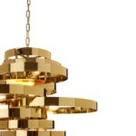 Luxe gold pendant light with concentric circular rings and 5-bulb design, perfect for upscale interior lighting.