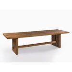 Large oakwood and black metal dining table with industrial design, handcrafted from natural wood with a sleek iron base.