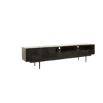 Black carved wood TV/media unit with slim black metal legs, featuring ample storage and wide top surface for large televisions.