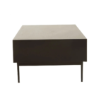 Black finish coffee table with carved wood surface and slender metal legs, perfect for contemporary living room settings.