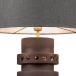 UNFO Black Table Lamp – 98cm earthenware lamp with bronze finish, circular cut-out base, and grey shade. Sculptural lighting for luxury interiors.
