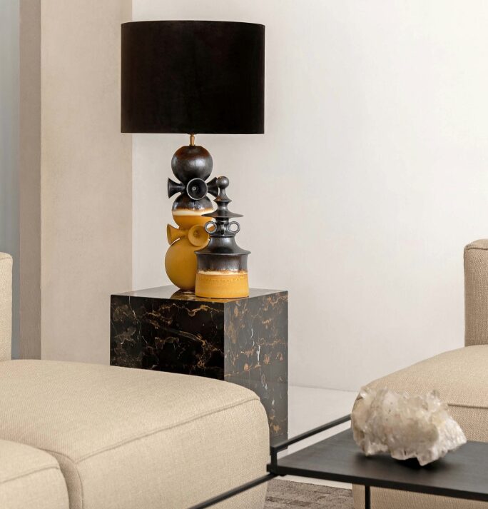 ZULZA Black Mindi Wood Cabinet with geometric chevron design and black steel frame – modern storage furniture.