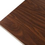 ELLIOT Dining Table 70x70 with smoked eucalyptus laminate top, brushed champagne edge, and dark bronze steel base.