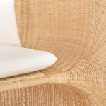 FOLE Rattan Chair with natural handwoven rattan and white flame-retardant cushion – sculptural indoor armchair design.