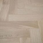 HERRINGBONE Oak 110 Bar Table – rectangular high table with herringbone wood top and black metal legs.