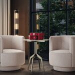 RAZOR Bro Side Table with round grey travertine top and brushed bronze base – compact modern accent table.
