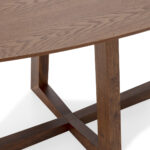 Alt text: LEGGERA Walnut Dining Table with oval oak veneer top, modern walnut dining table with sturdy base, elegant oval dining table for contemporary interiors.