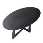 Alt text: LEGGERA Black Dining Table with oval oak veneer top, modern black dining table with sturdy base, elegant oval dining table in sleek black finish for contemporary interiors.