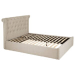 ELLI Grey Ottoman Double Bed with winged rolled-edge headboard, button-tufted panels, and soft light grey linen upholstery, offering classic style and storage functionality.