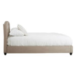 LAYA Mink Double Bed with brushed velvet upholstery, diamond-tufted arched headboard, metallic button detailing, and black orb feet.