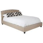 LAYA Beige Kingsize Bed with arched tufted headboard, beige hopsack upholstery, and stud detailing for a refined and contemporary bedroom design.
