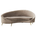 CYRUS mink three seater sofa with sculptural silhouette, upholstered in soft velvet with deep foam cushioning and matte black metal legs, combining modern elegance with comfort.