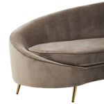 CYRUS mink three seater sofa with sculptural silhouette, upholstered in soft velvet with deep foam cushioning and matte black metal legs, combining modern elegance with comfort.