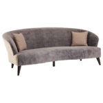 ALDO three-seat grey velvet sofa with oatmeal-toned sides and back, rounded armrests, curved seat front, and slim black pine wood legs for a modern and elegant look.