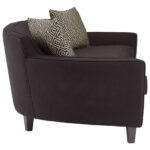 RANIA three-seat black sofa with sweeping low-profile backrest, arcing arms, single curved cushion, and chevron-patterned dimity fabric upholstery on pine wood legs