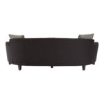 RANIA three-seat black sofa with sweeping low-profile backrest, arcing arms, single curved cushion, and chevron-patterned dimity fabric upholstery on pine wood legs
