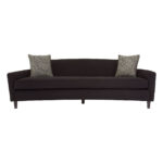 RANIA three-seat black sofa with sweeping low-profile backrest, arcing arms, single curved cushion, and chevron-patterned dimity fabric upholstery on pine wood legs
