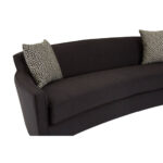 RANIA three-seat black sofa with sweeping low-profile backrest, arcing arms, single curved cushion, and chevron-patterned dimity fabric upholstery on pine wood legs