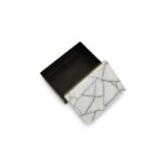 LIMA Small Marble Trinket Box with sleek black base and white marble lid featuring a subtle crackled effect, crafted from marble and iron for compact modern storage.