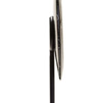 ROMEO Small Round Sculpture – black marble disc with natural veining on black metal stand, modern decorative accent.