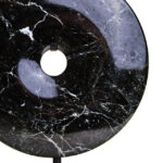 ROMEO Small Round Sculpture – black marble disc with natural veining on black metal stand, modern decorative accent.