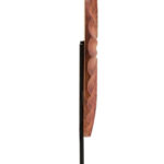 SOREL Brown Wooden Sculpture – handcrafted carved wood disc with radiating segments mounted on black metal base.