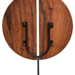 SOREL Brown Wooden Sculpture – handcrafted carved wood disc with radiating segments mounted on black metal base.