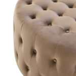 The LUCRA Mink Velvet Footstool features plush velvet upholstery, button tufting, and foam padding. A versatile round ottoman for luxe, modern, or classic interiors.