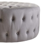LUCRA Grey Velvet Footstool – round grey velvet footstool with button tufting and foam padding.