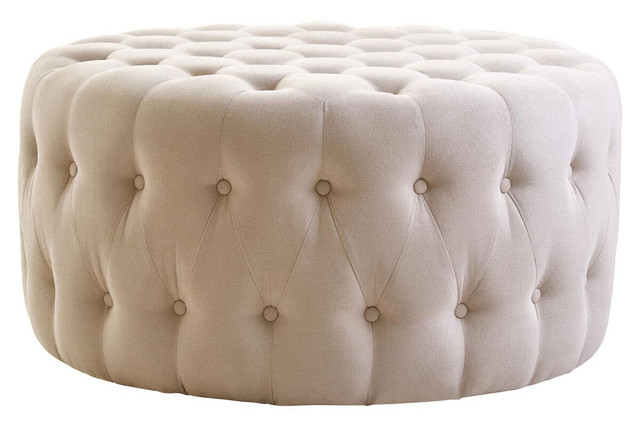 LUCRA Beige Velvet Footstool – round beige velvet footstool with button tufting and foam padding.