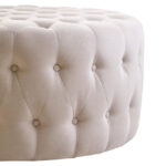 LUCRA Beige Velvet Footstool – round beige velvet footstool with button tufting and foam padding.