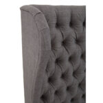 ANTON Super Kingsize Grey Headboard upholstered in grey fabric with deep button tufting, tall wingback sides, and a mid-century modern silhouette.